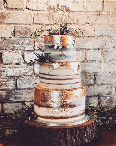 Tiered Semi Naked Wedding Cake With Gold Leaf Thistle And Blackberries