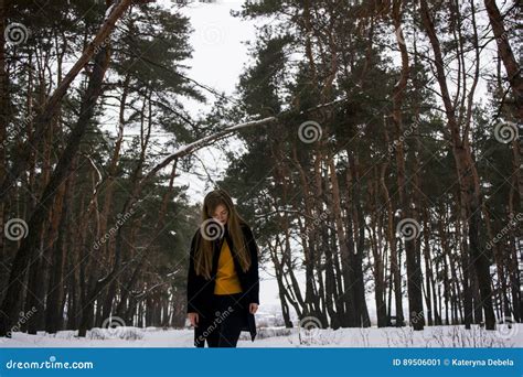 Beautiful Girl In A Snowy Forest Blonde With Long Hair Smiling In