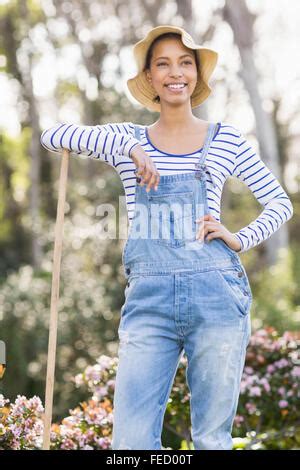 Pretty Brunette Doing Some Gardening Activities Stock Photo Alamy