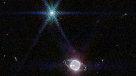 Neptune's rings are seen clearly in an image from the James Webb telescope : NPR