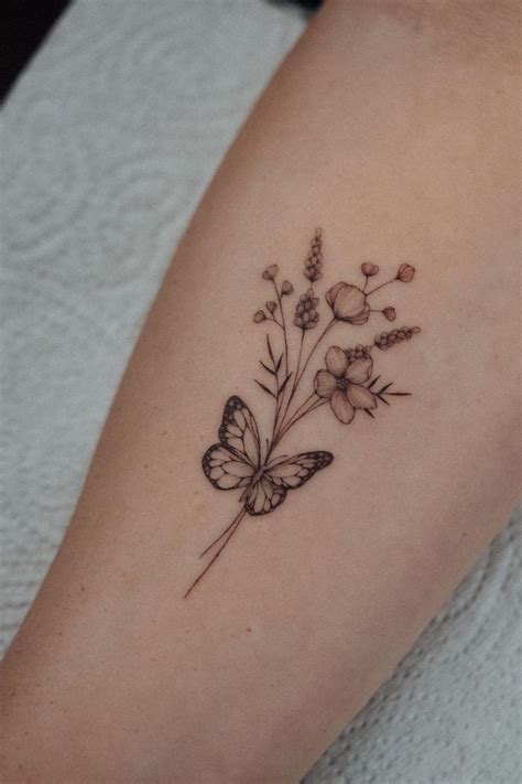 Most Stunning Butterfly Tattoo Design Ideas And Meaning Butterfly Wrist Tat Butterfly Arm Tattoo