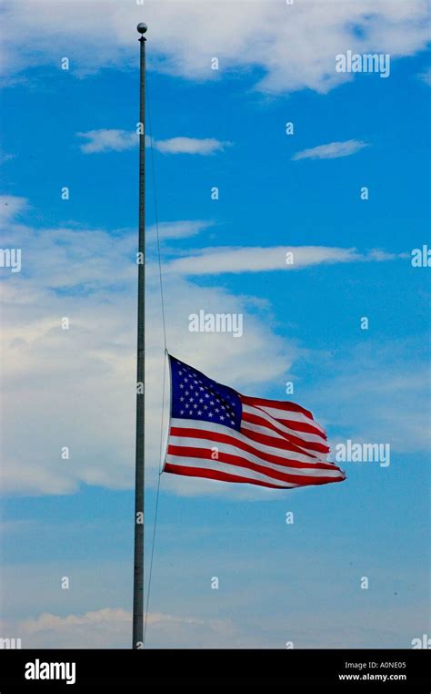 American flag flying at half staff Stock Photo - Alamy