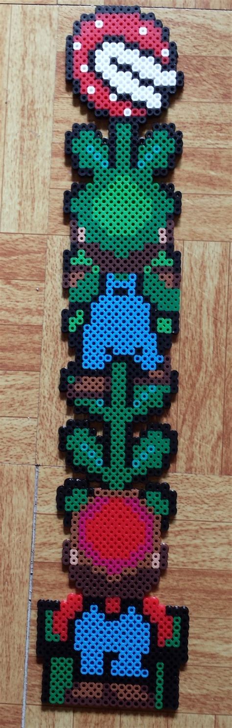 Mario And Luigi Climbing A Piranha Plant Perler Art By Joanne Schiavoni Diy Perler Bead