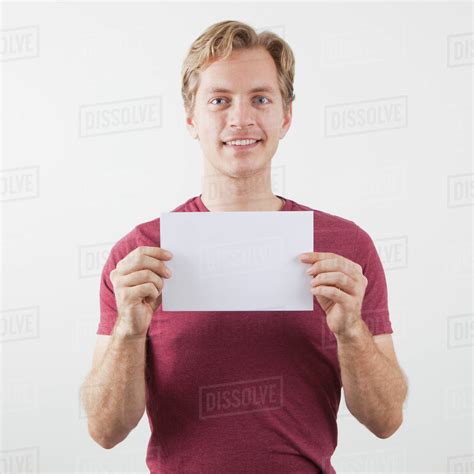 Person Holding Blank Paper