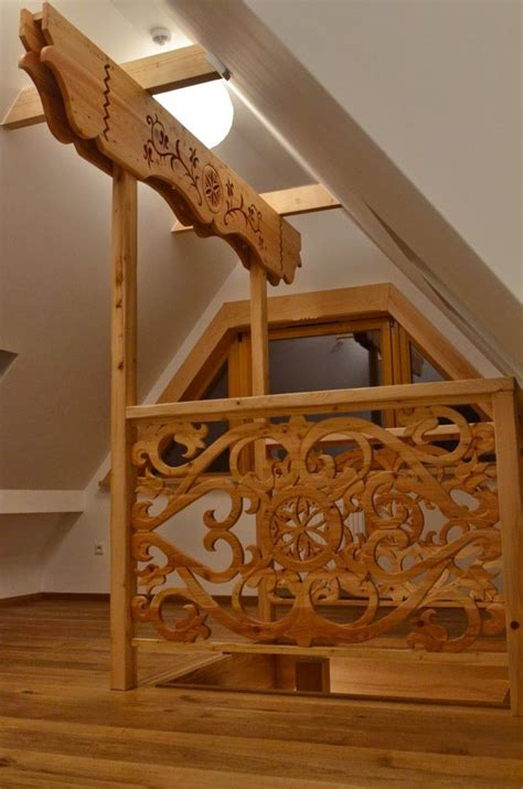 A Wooden Structure In The Middle Of A Room With Wood Flooring And White