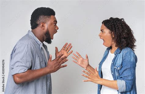 Couple Arguing Angry Black Man And Woman Shouting At Each Other Stock