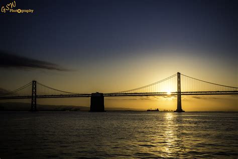 Bay Bridge Sunrise The Sun Rising Behind The Bay Bridge In Flickr