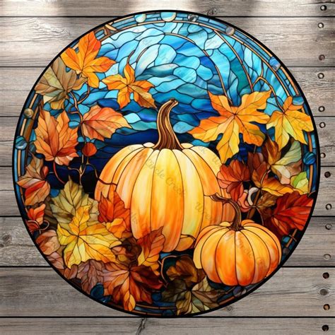 A Stained Glass Window With Autumn Leaves And Pumpkins On The Outside