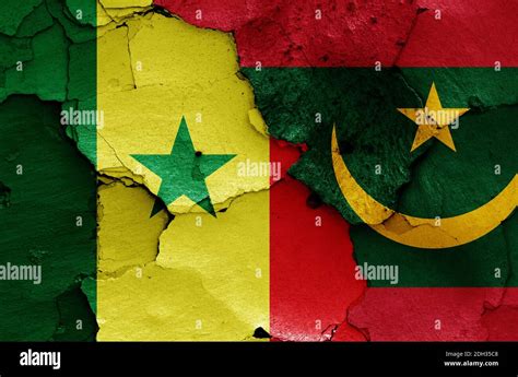 Flags Of Senegal And Mauritania Painted On Cracked Wall Stock Photo Alamy