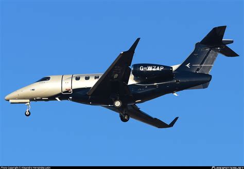 G Wzap Titan Airways Embraer Emb Phenom Photo By Alejandro