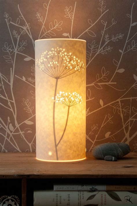 Glowing Handmade Parchment Paper Lamps With Cut Out Nature Designs By