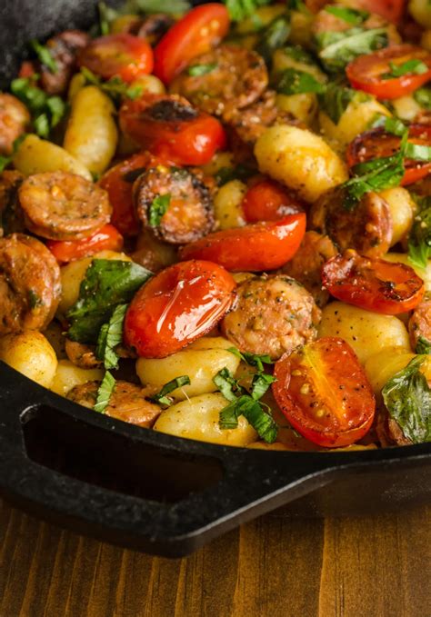 A Skillet Filled With Lots Of Different Types Of Food On Top Of A