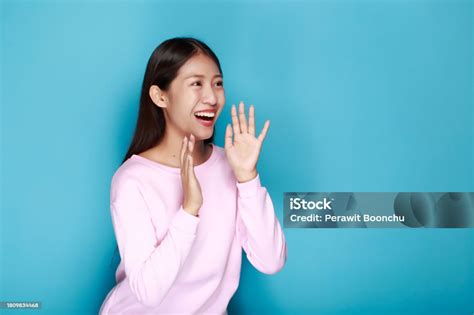 Shouting With Mouth Wide Open Friendly Young Woman Asian Woman With