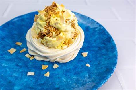 Mango And Passion Fruit Ice Creams With Coconut Clusters In Banana