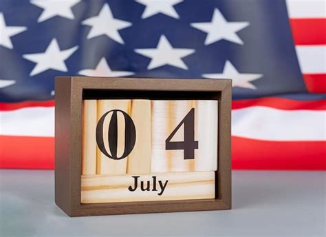 Calendario De Madera De Julio Con Una Bandera Americana Generativa Ai