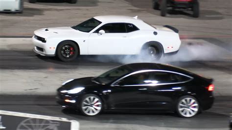 Tesla Model And Y Drag A Couple Of Dodge Challenger Hellcats Someone