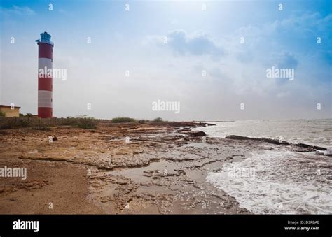 Lighthouse at the coast, Dwarka Beach, Dwarka, Gujarat, India Stock ...