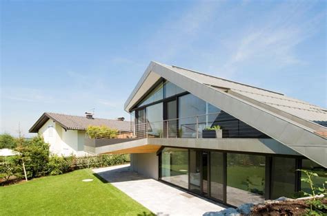 Slope Roof House With Futuristic Interiors