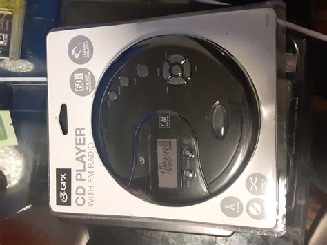 Cd Player With Fm Radio Anti Skip Protection Earbuds New Gpx Pc332b