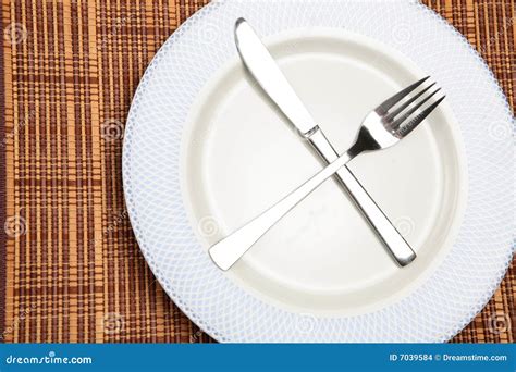 A Plate With Utensils Stock Photo Image Of Porcelain 7039584