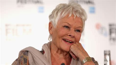 Judi Dench gets a "Carpe Diem" wrist tattoo for her 81st birthday - CBS ...