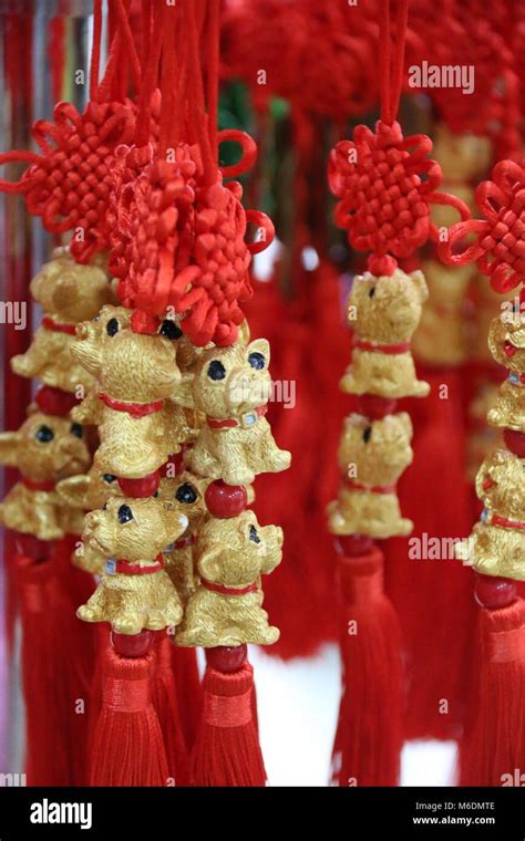 Golden chinese good luck charms Stock Photo - Alamy