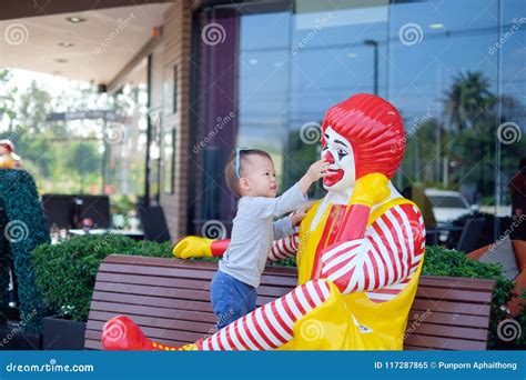 Happy Cute Little Asian Toddler Baby Boy Child Play With Ronald