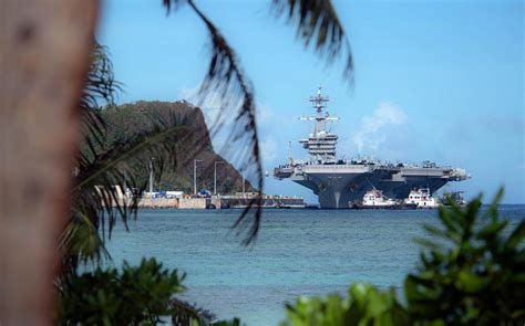 Stars And Stripes USS Theodore Roosevelt Sailors Begin Moving Back