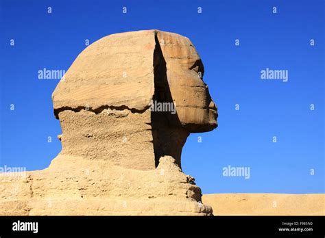 Great Ancient Sculpture Of Egyptian Sphinx And Pyramid Stock Photo Alamy