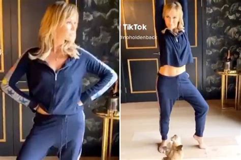 BGT Babe Amanda Holden S Dress Flies Up As She Shows Off Plunging Dress