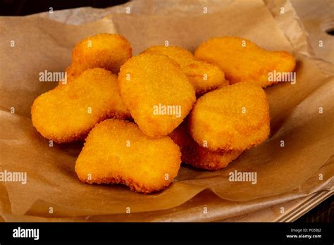 Golden Chicken Fried Nuggets Heap Stock Photo Alamy