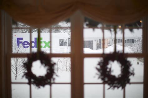 FedEx Ground delivery van through a festive window | Parcel delivery ...