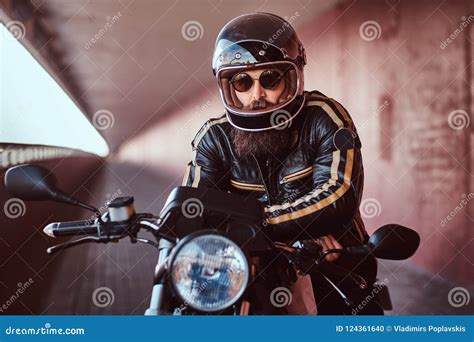 Close-up Portrait of a Brutal Bearded Biker in Helmet and Sunglasses ...