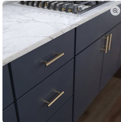 Gold Handles Dark Bottom Doors And Marble Counter Navy Blue Kitchen