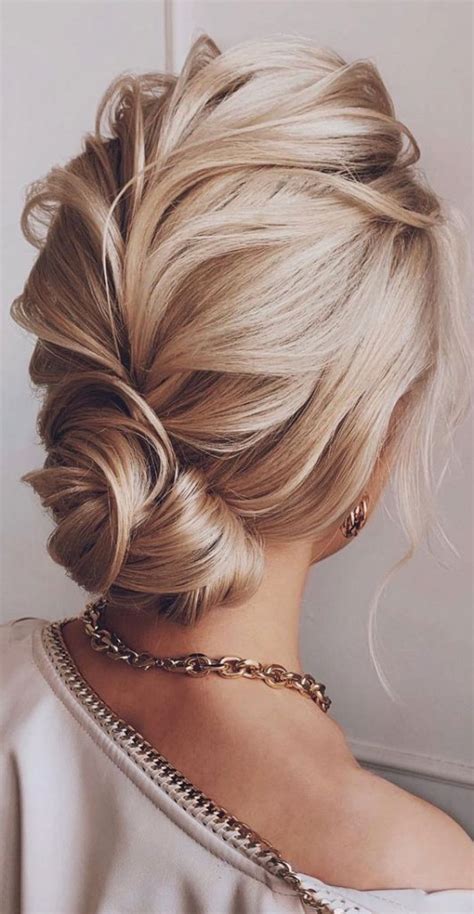 Updo Hairstyles For Your Stylish Looks In 2021 : Elegant & trendy low bun