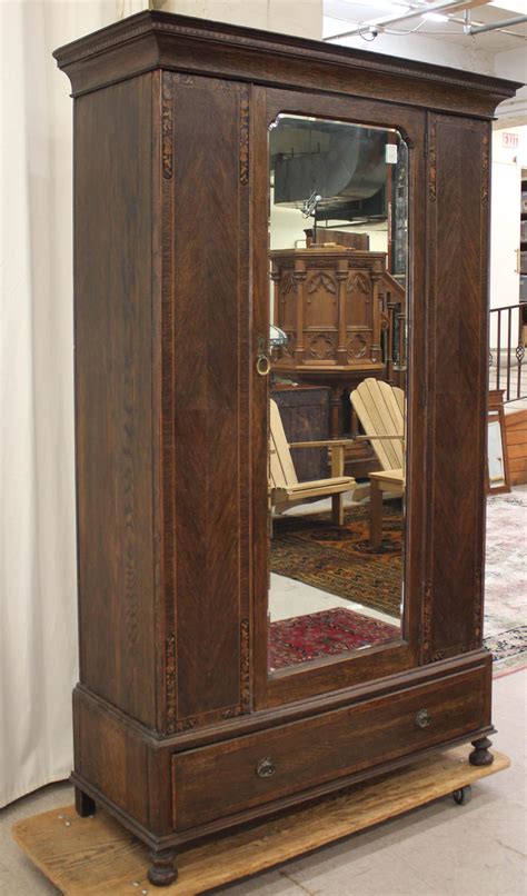 Lot - INLAID OAK SINGLE-DOOR WARDROBE