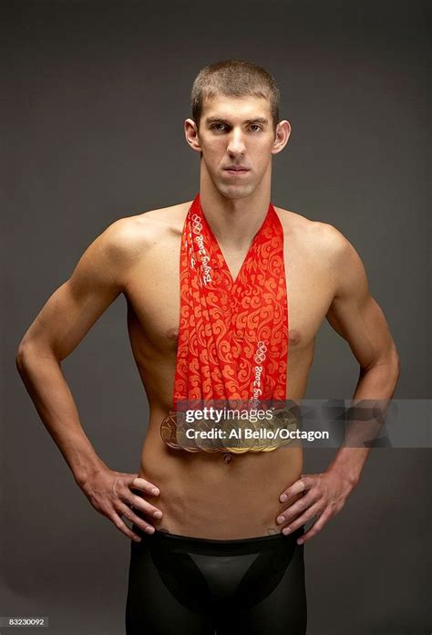 Swimmer Michael Phelps Of The United States Poses With His Eight Gold