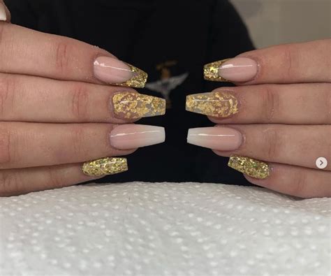 Shine Bright with These 50 Glamorous Gold Glitter Nail Ideas!