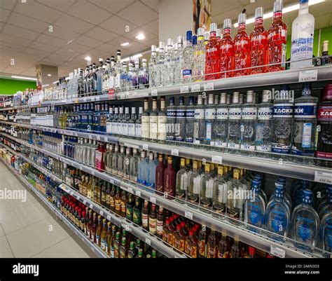 Supermarket Aisle With Varieties Of Vodka Brands And Bottles Irkutsk