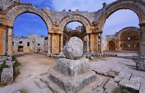 St Simeons pillar in the ruins of the church of St Simeon Syria Photograph by Robert Preston