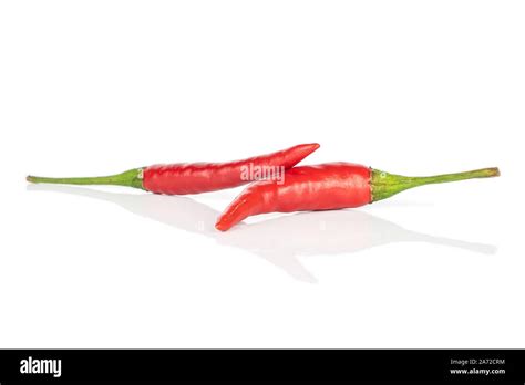 Group Of Two Whole Hot Red Chili Isolated On White Background Stock Photo Alamy