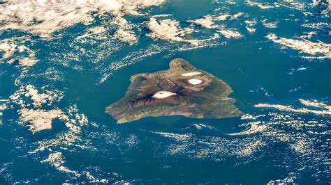 The Big Island Of Hawaiʻi With The Snow Capped Peaks Of Mauna Kea And Mauna Loa As Seen From