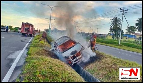 Kenderaan Perodua Aruz Terbakar Di Bahu Jalan Lokawi Putatan Sabah