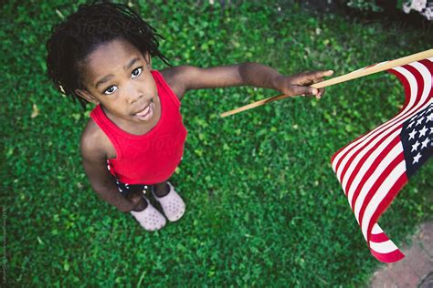 "African-American Girl In Red, White And Blue USA Flag Outfit Holding A ...