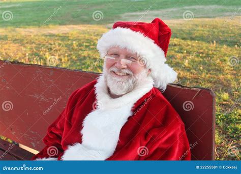 Santa Relaxing On A Bench Stock Image Image Of Happy