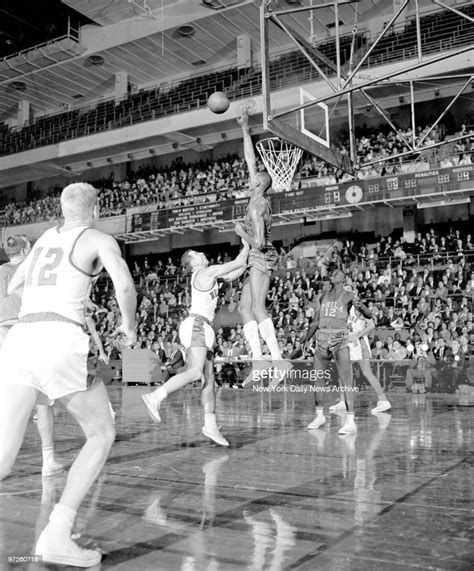 Knicks' Richie Guerin lobs one over Wilt Chamberlain's boarding-house ...