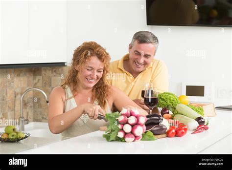 Mature Couple In The Kitchen Stock Photo Alamy