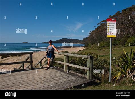 Woman on Pebbly Beach at Murramarang National Park in Australia Stock ...