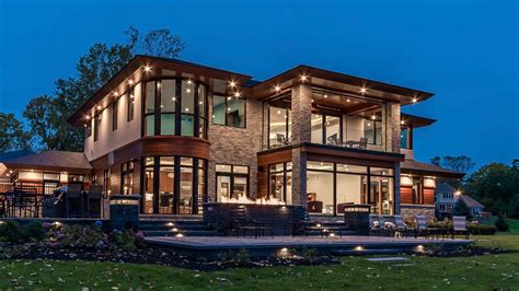 This Contemporary Lake House Embraces Stone Wood And Glass Realstone Systems