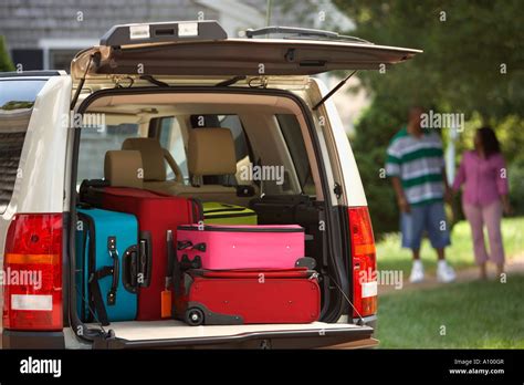 Trunk Of SUV Loaded With Luggage Stock Photo Alamy